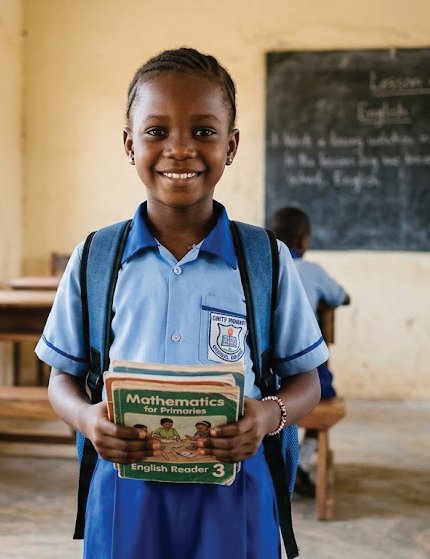 Sponsored pupil receiving school materials